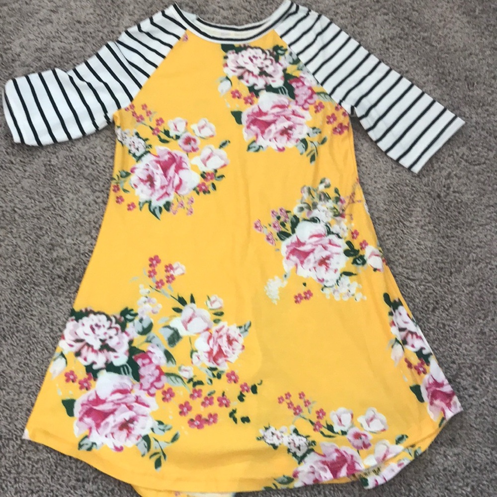 A dress or shirt- has never been worn